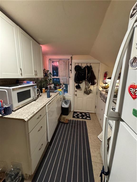 238-242 Philadelphia Street Indiana, PA 15701 - Photo 20 of 25 a kitchen that has a sink and a stove in it