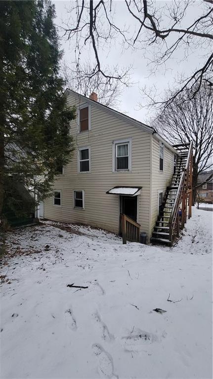 238-242 Philadelphia Street Indiana, PA 15701 - Photo 25 of 25 a view of a house with a snow in the background