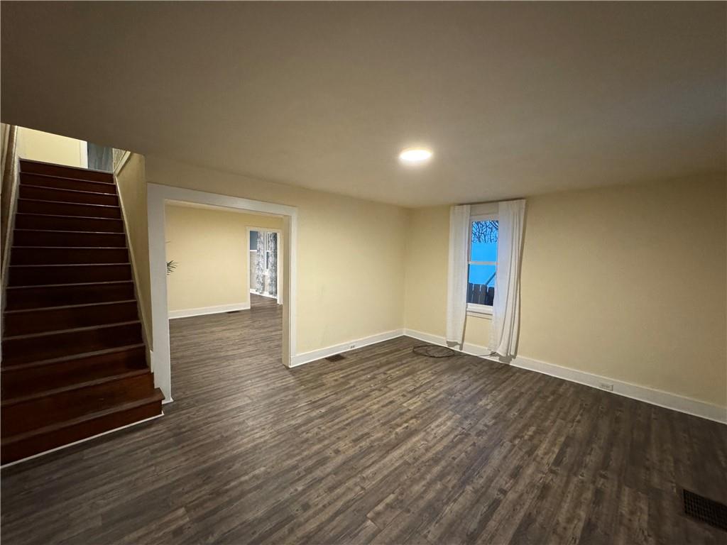 238-242 Philadelphia Street Indiana, PA 15701 - Photo 6 of 25 wooden floor in an empty room with a window