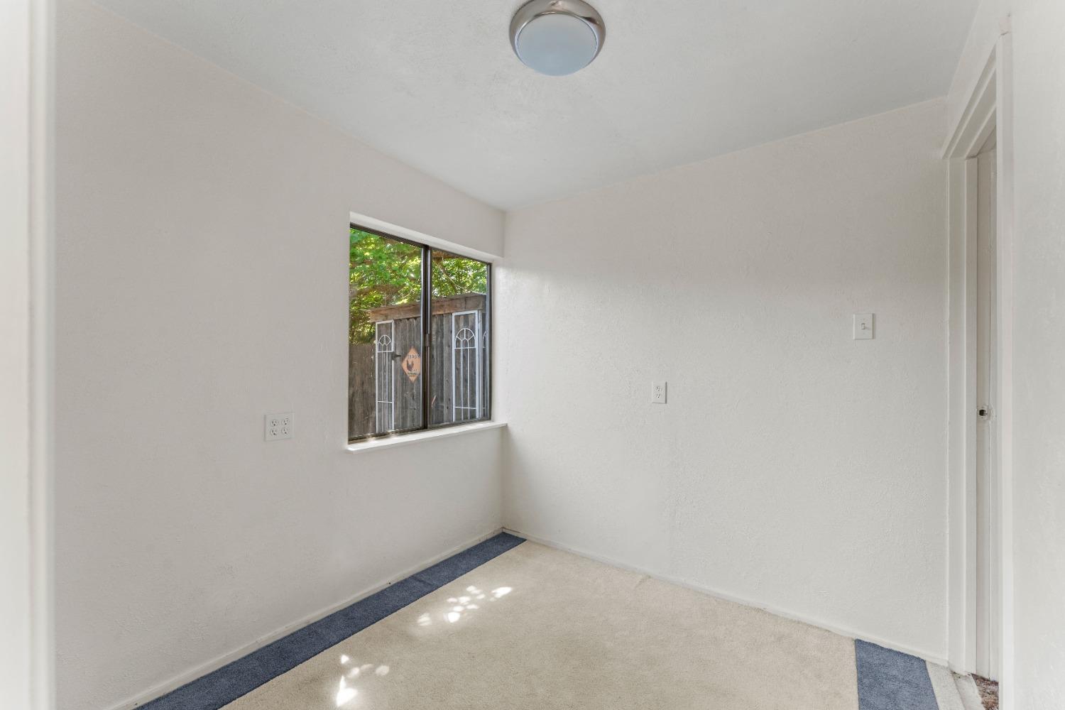 6849 26th Street Rio Linda, CA 95673 - Photo 17 of 56 an empty room with windows