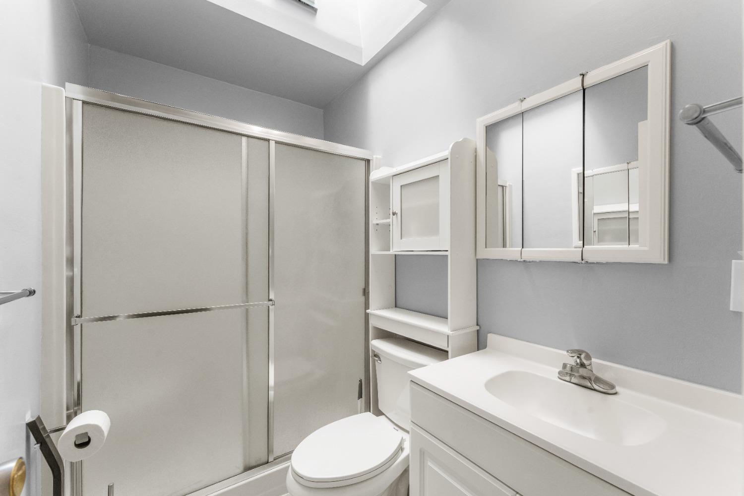 6849 26th Street Rio Linda, CA 95673 - Photo 20 of 56 a bathroom with a sink toilet and shower