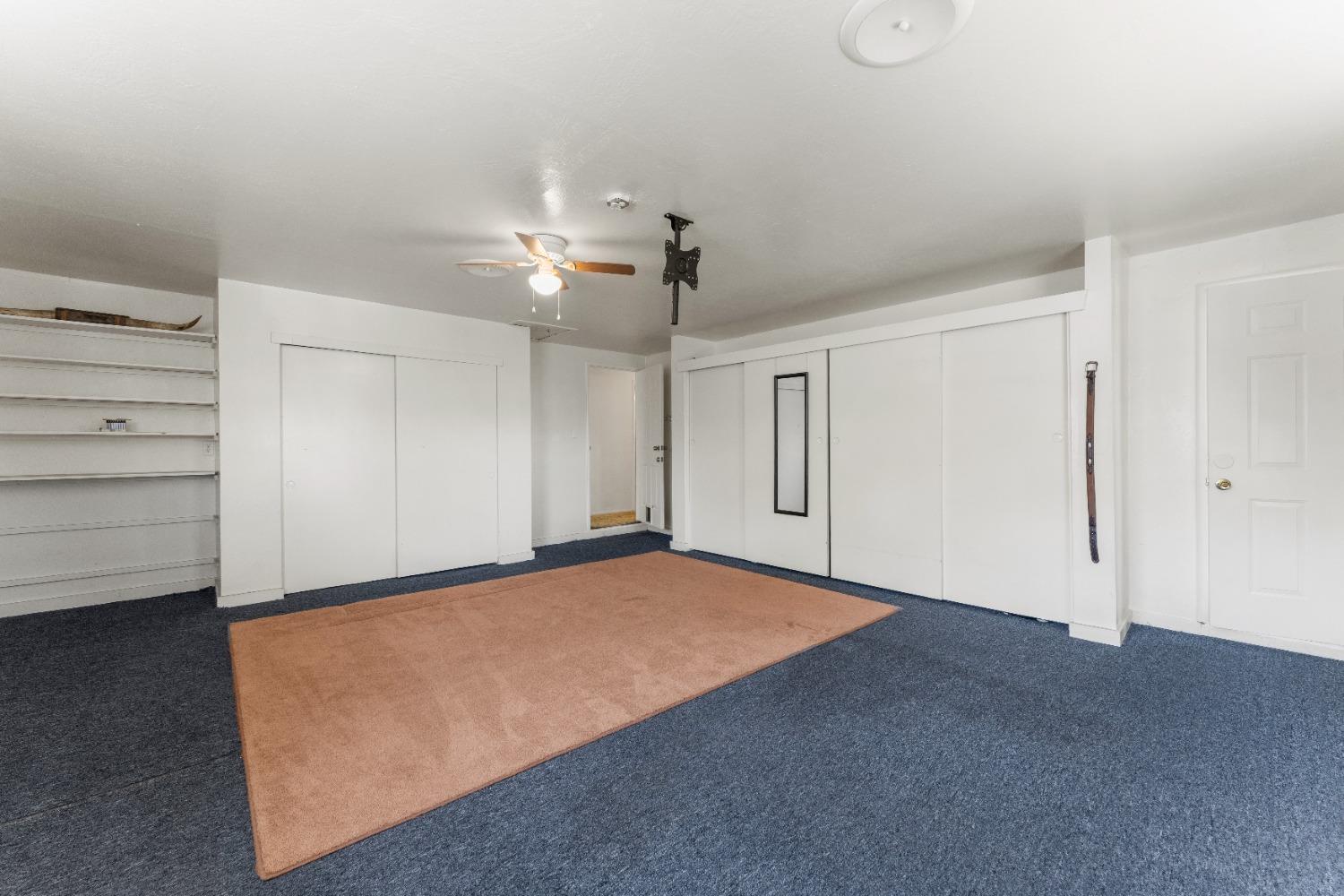 6849 26th Street Rio Linda, CA 95673 - Photo 22 of 56 a view of an empty room with a ceiling fan