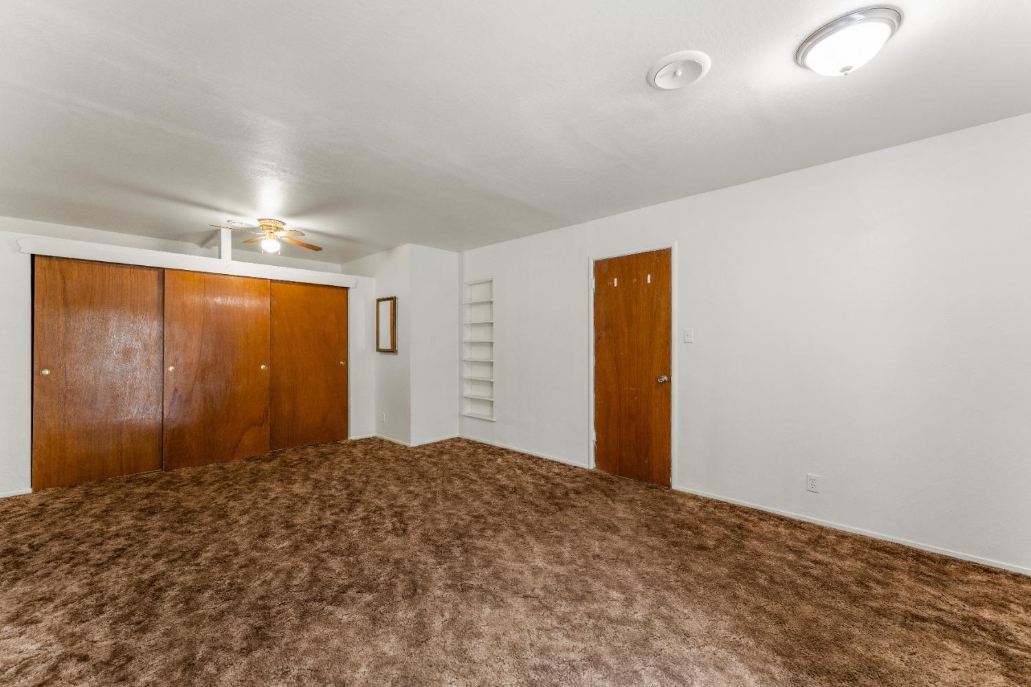 6849 26th Street Rio Linda, CA 95673 - Photo 24 of 56 a view of a big room with closet and front door