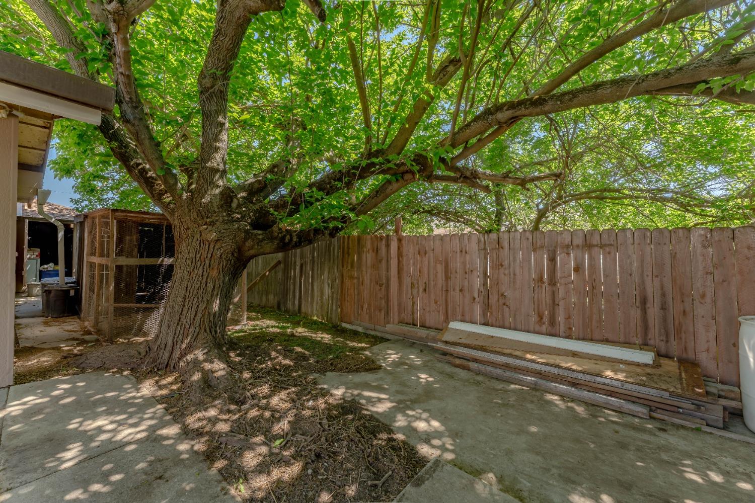 6849 26th Street Rio Linda, CA 95673 - Photo 31 of 56 a backyard of a house with table and chairs