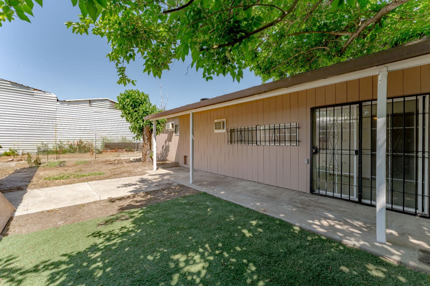 6849 26th Street Rio Linda, CA 95673 - Photo 32 of 56 a view of a backyard with a tree