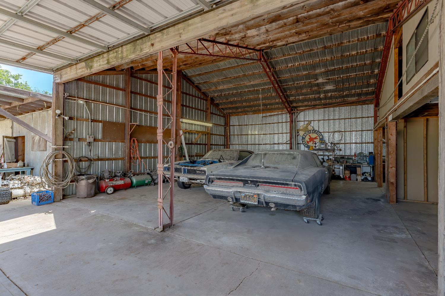 6849 26th Street Rio Linda, CA 95673 - Photo 37 of 56 a backyard of a house with barbeque oven table and chairs