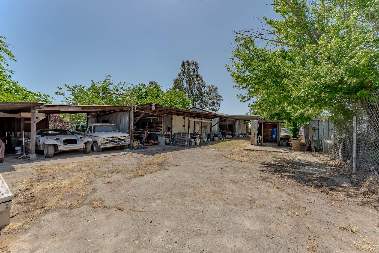 6849 26th Street Rio Linda, CA 95673 - Photo 43 of 56 a view of a house with car parked beside of a road