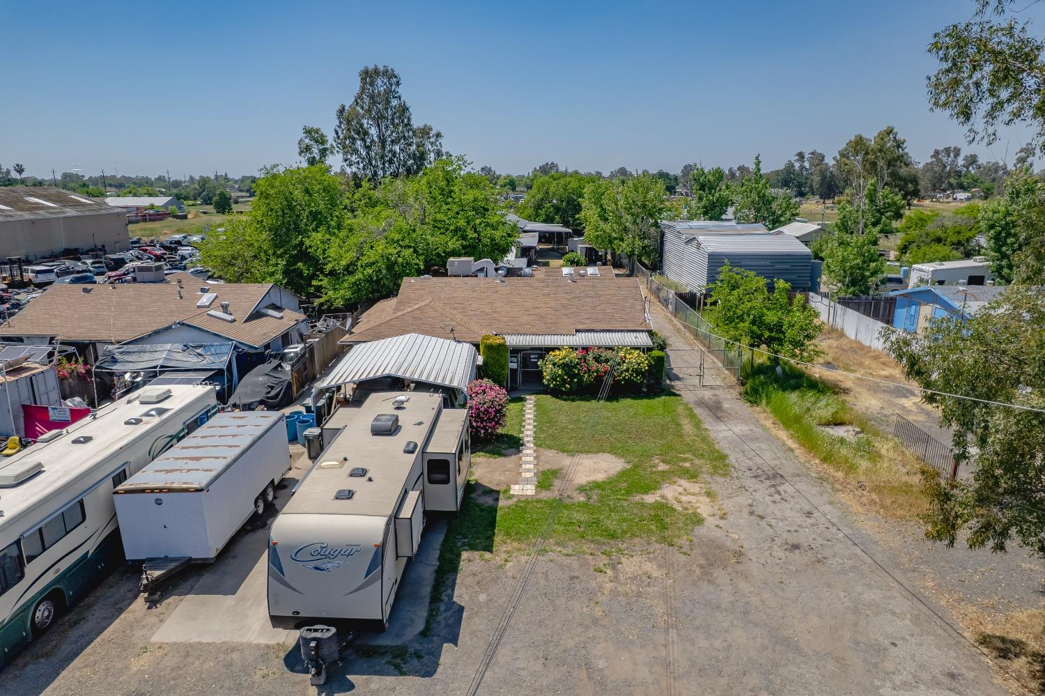 6849 26th Street Rio Linda, CA 95673 - Photo 47 of 56 an aerial view of a house with garden space and street view