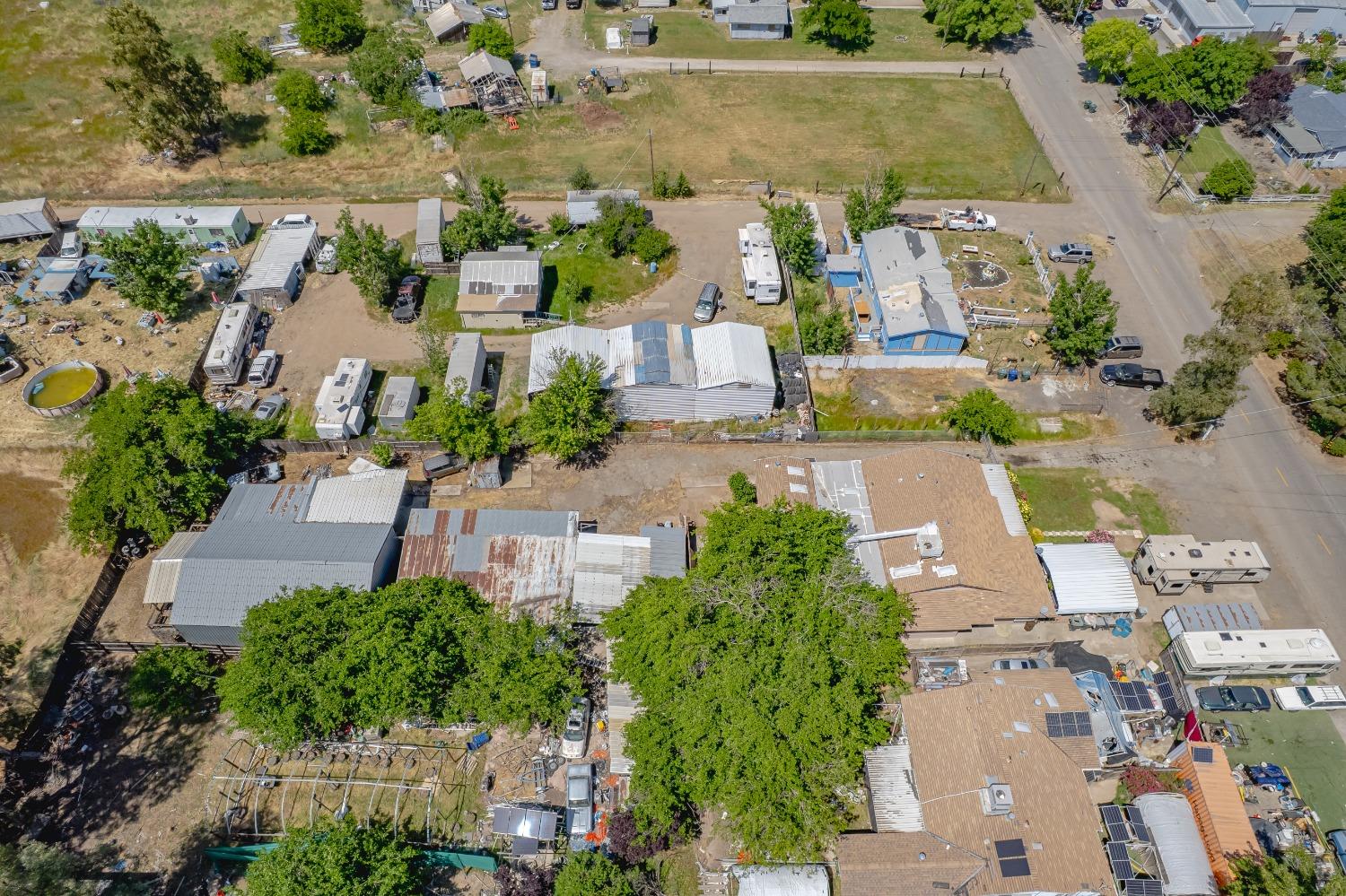 6849 26th Street Rio Linda, CA 95673 - Photo 54 of 56 an aerial view of a house with a yard and lake view