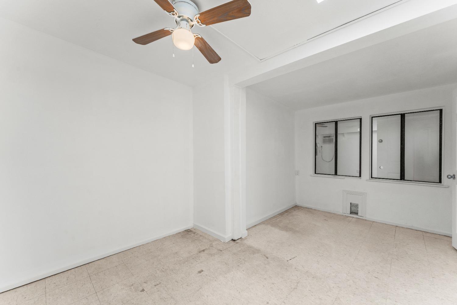 6849 26th Street Rio Linda, CA 95673 - Photo 9 of 56 an empty room with chandelier fan