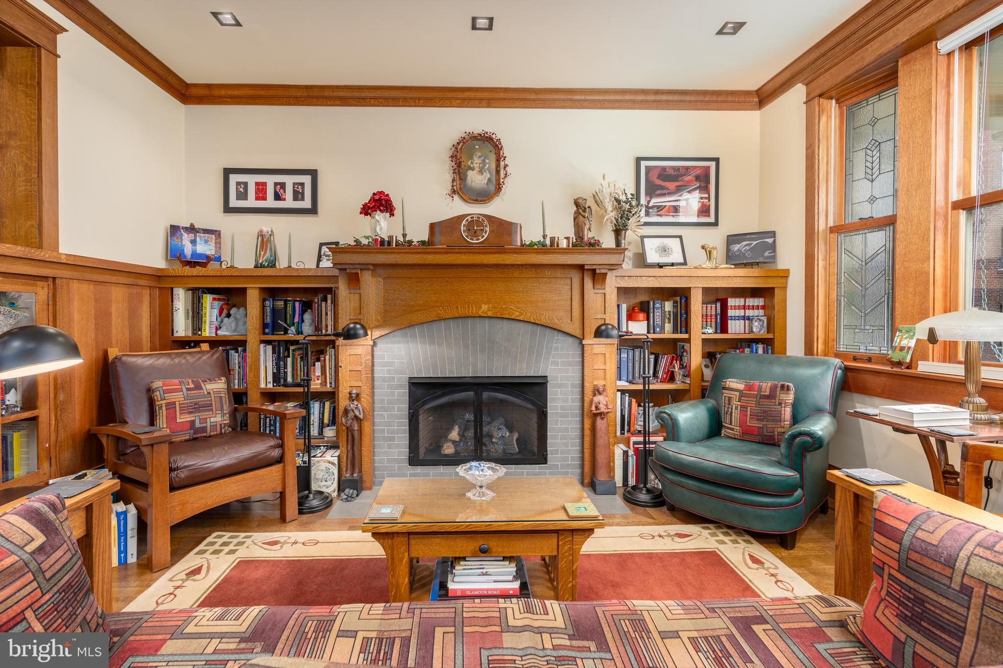 1737 Church Street Northwest Washington, DC 20036 - Photo 2 of 58 a living room with furniture a rug and a fireplace