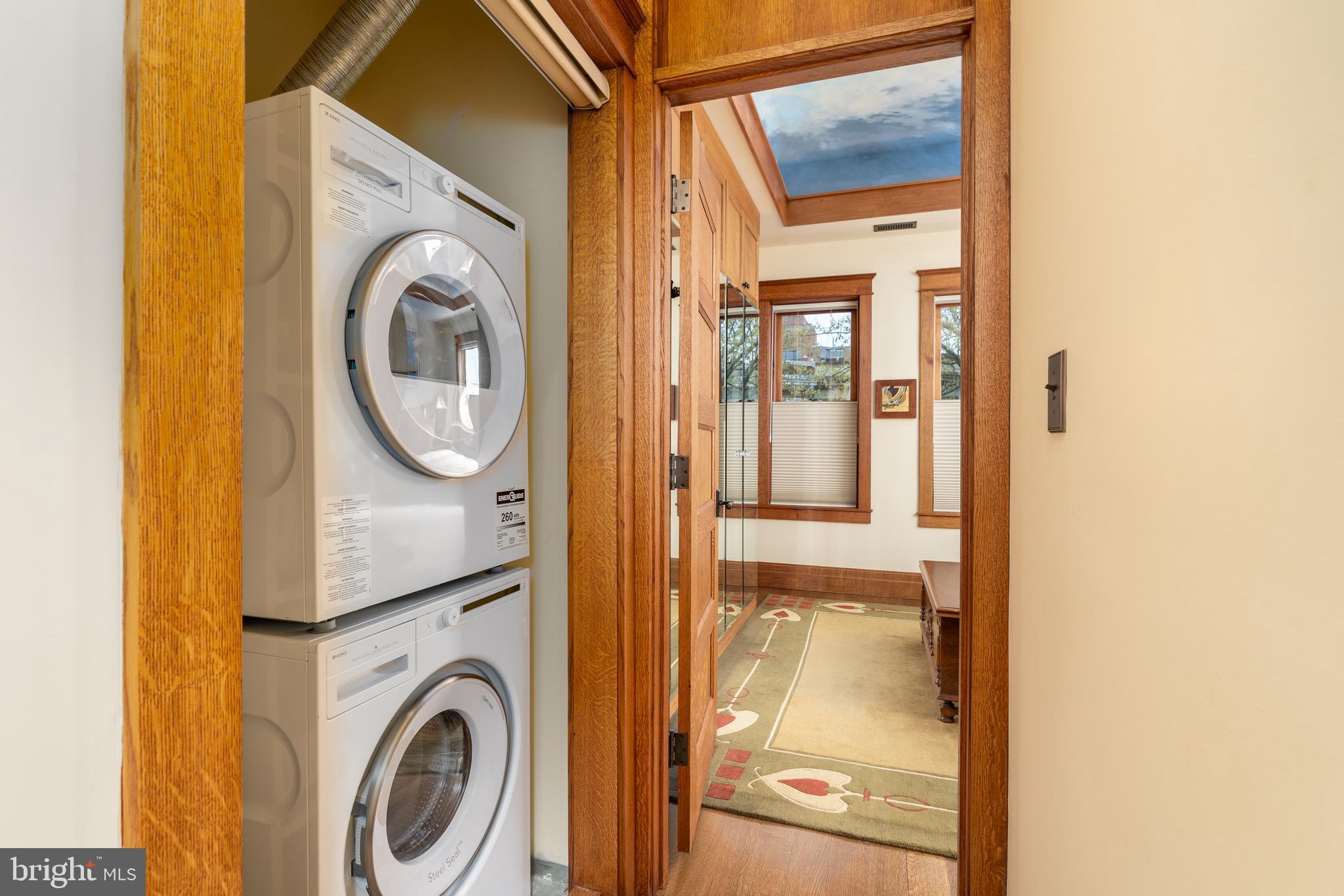1737 Church Street Northwest Washington, DC 20036 - Photo 33 of 58 a view of a hallway with washer and dryer