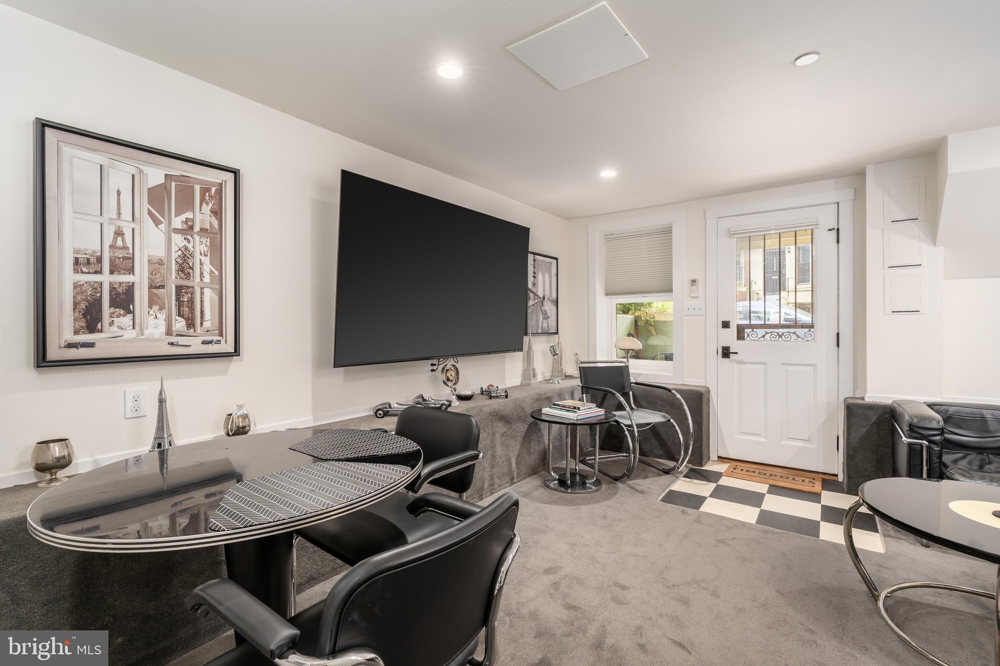 1737 Church Street Northwest Washington, DC 20036 - Photo 49 of 58 a living room with furniture and a flat screen tv