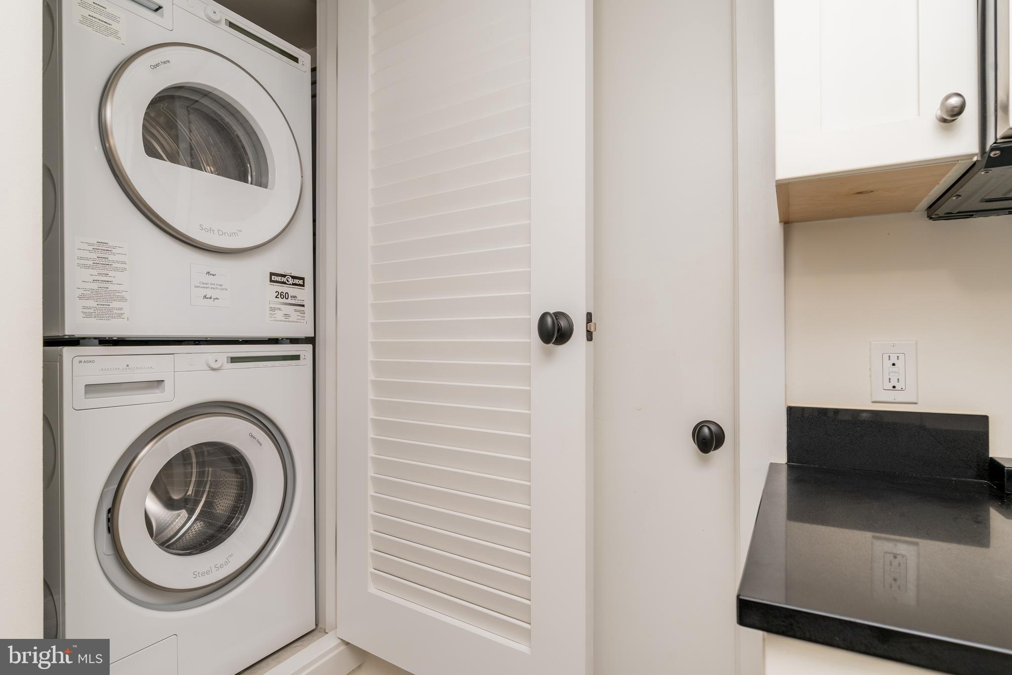 1737 Church Street Northwest Washington, DC 20036 - Photo 53 of 58 a view of a bathroom with a washer and dryer