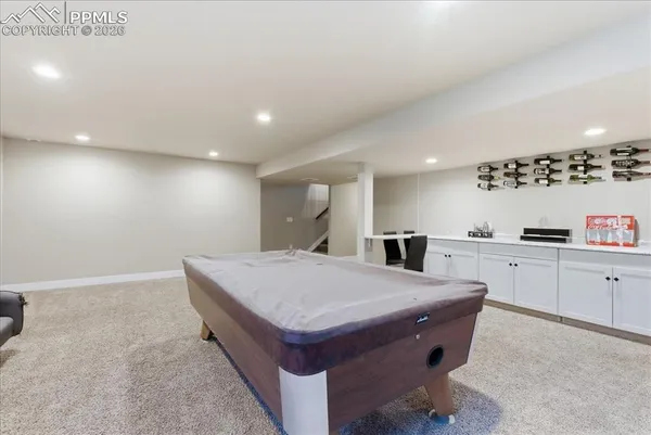 a room with sink and window