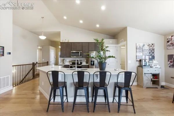 a view of a dining room with furniture