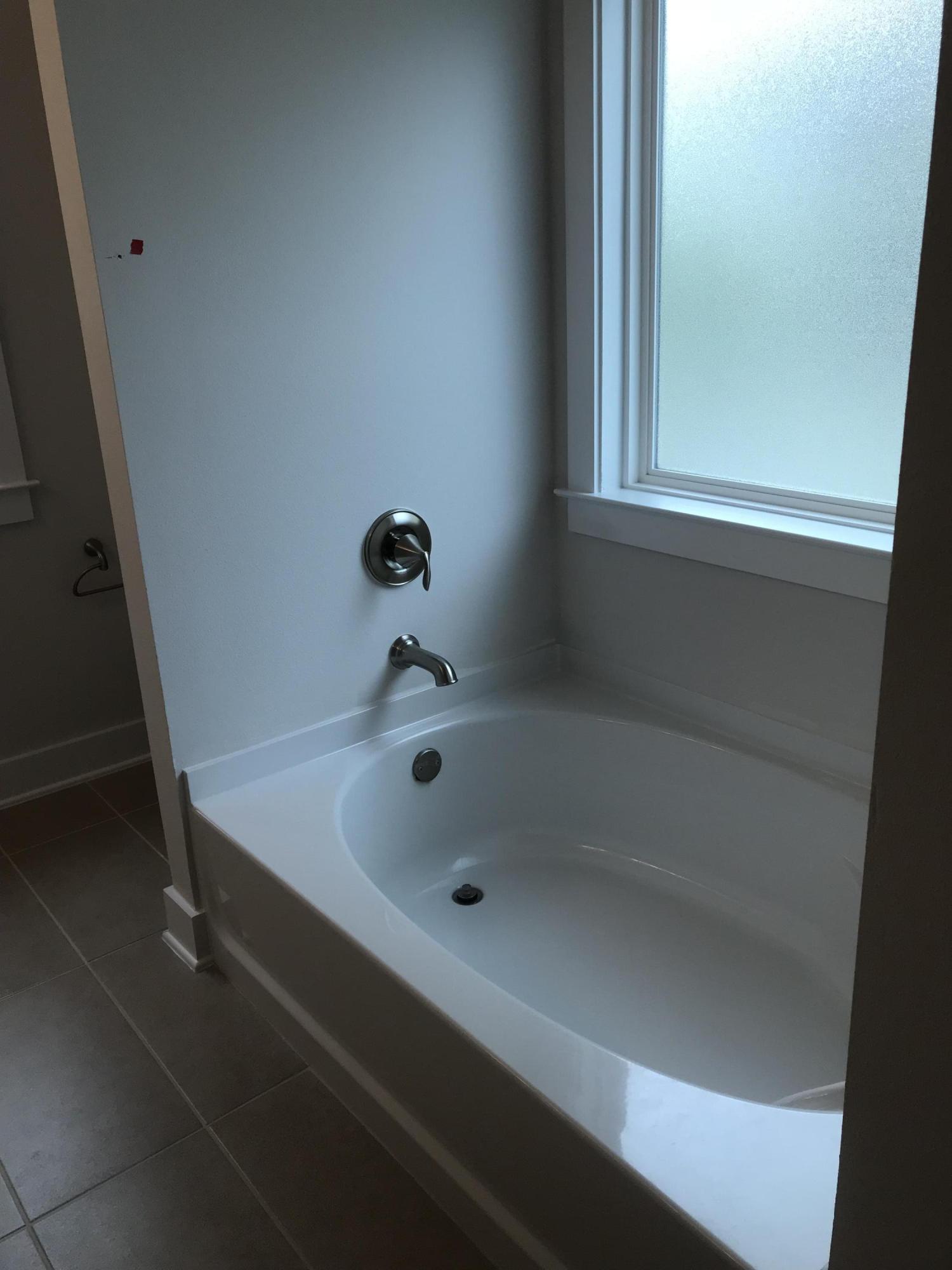 378 Grande Pointe Dr Inlet Beach Inlet Beach, FL 32461 - Photo 12 of 18 a bathroom with a tub and a window