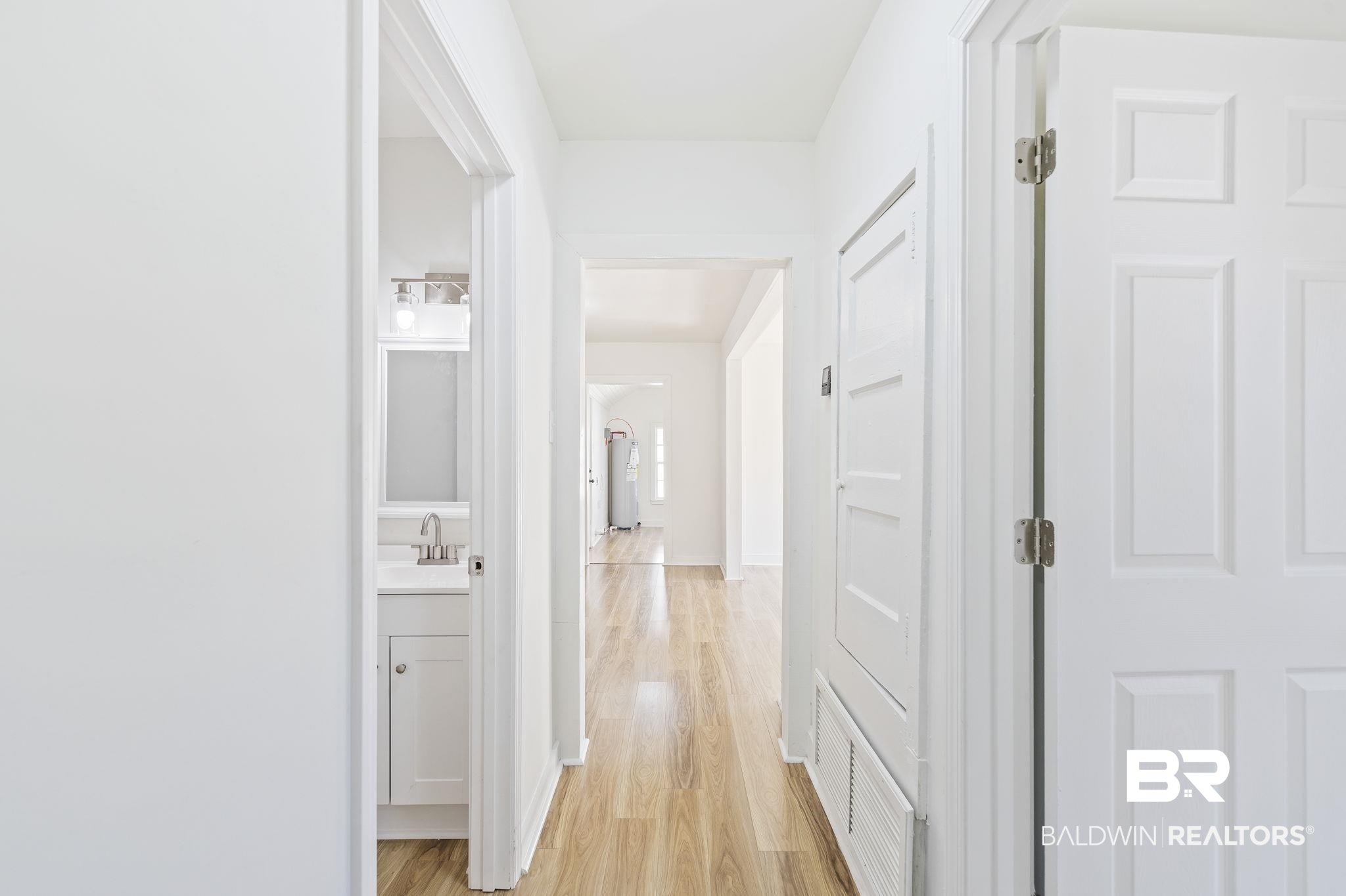1400 North Cloverleaf Circle Mobile, AL 36605 - Photo 15 of 17 Hallway with sink and light wood-type flooring