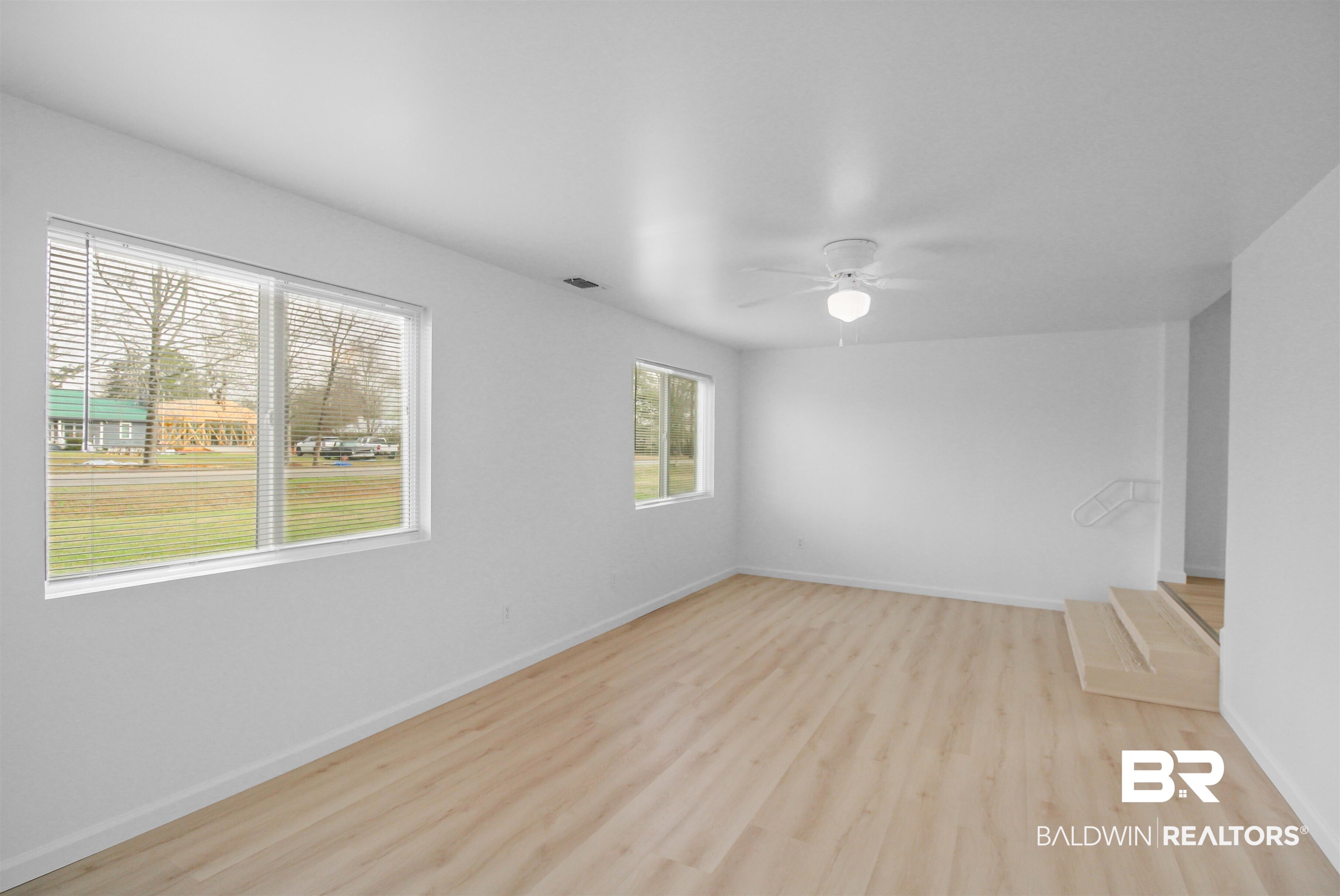 17622 Brewer Road Foley, AL 36535 - Photo 12 of 26 Unfurnished room with ceiling fan and light wood-type flooring