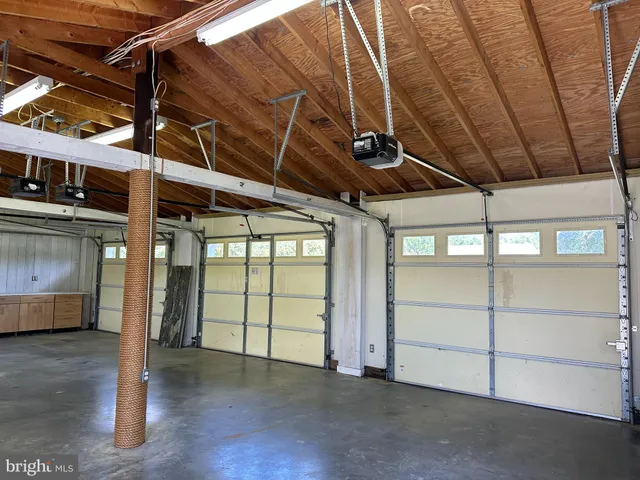 a view of a room with wooden walls