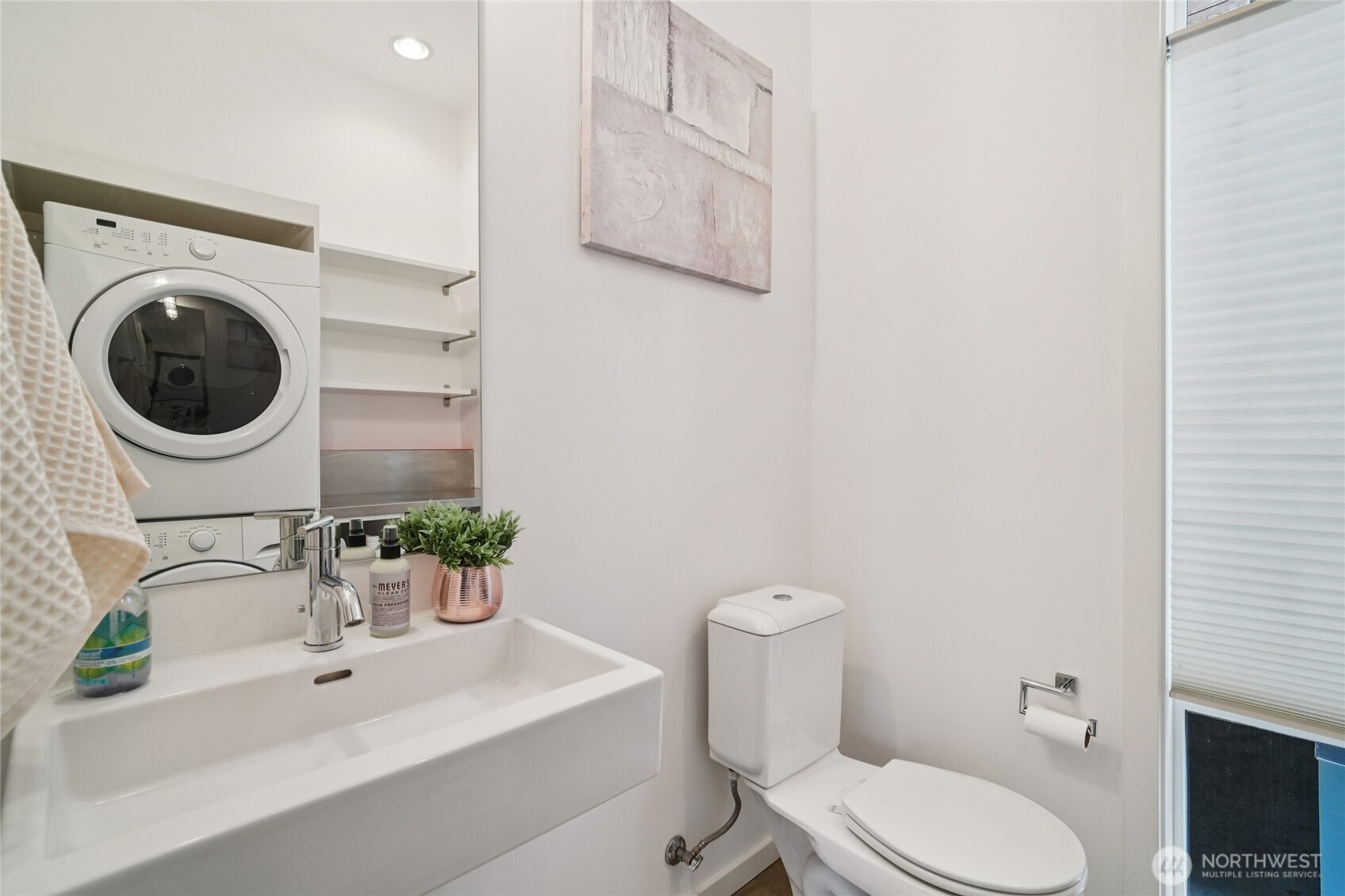 1321 South State Street, Unit C Seattle, WA 98144 - Photo 11 of 36 a bathroom with a sink a mirror and toilet