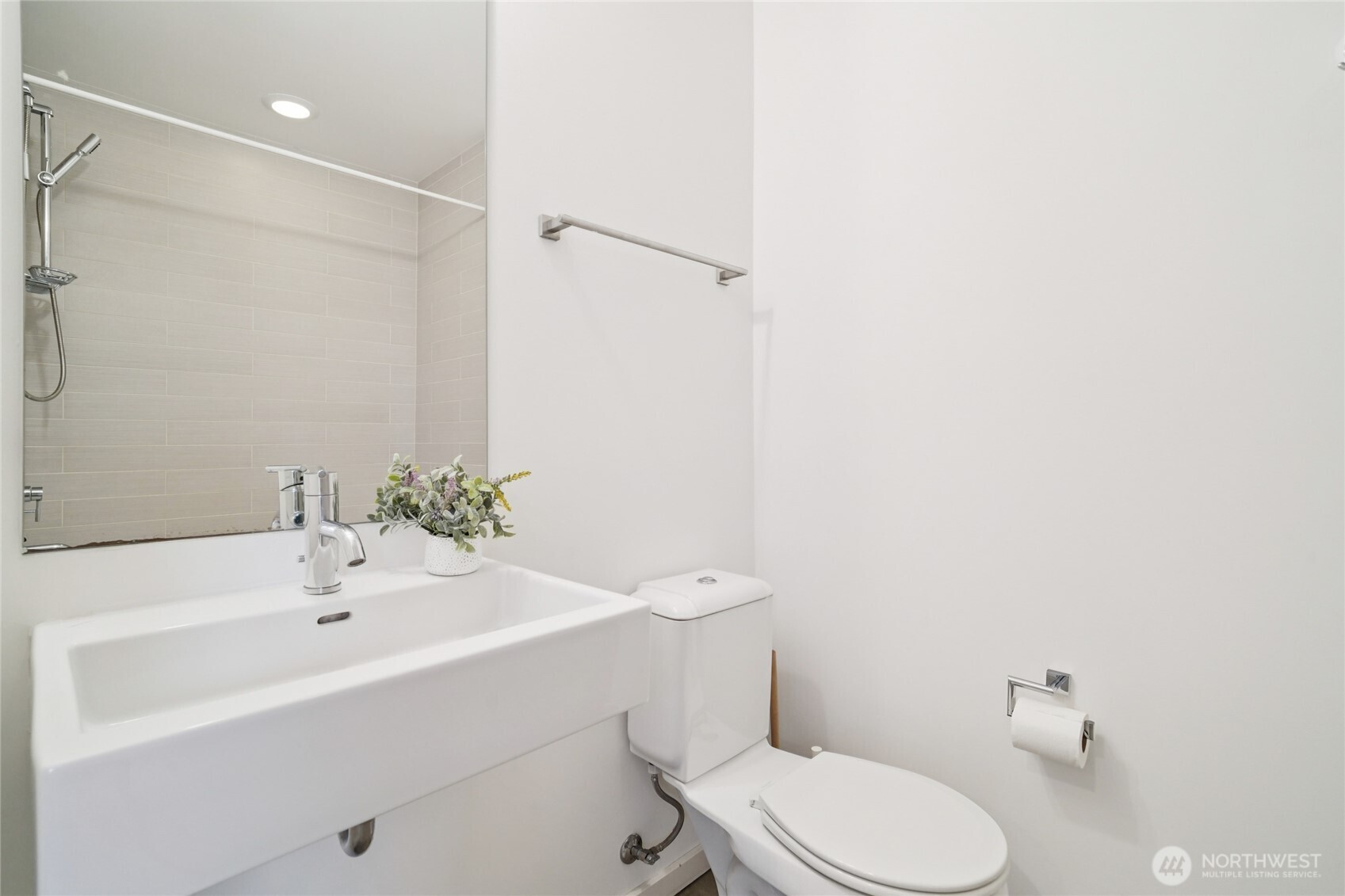 1321 South State Street, Unit C Seattle, WA 98144 - Photo 14 of 36 a bathroom with a sink a toilet and shower