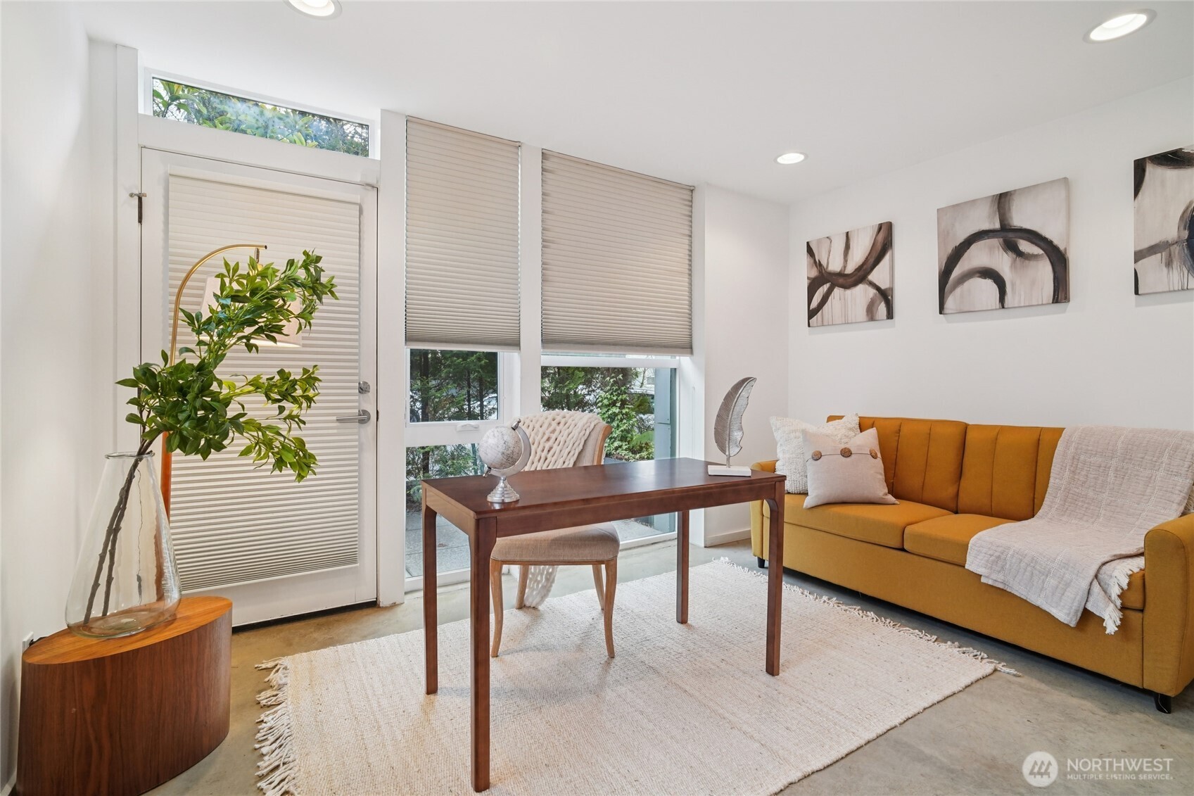 1321 South State Street, Unit C Seattle, WA 98144 - Photo 16 of 36 a living room with furniture and a potted plant