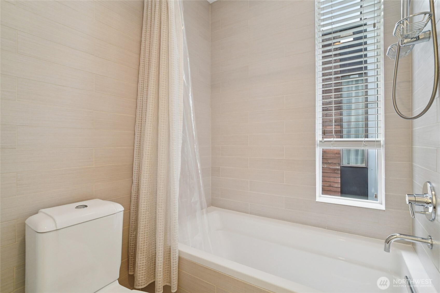 1321 South State Street, Unit C Seattle, WA 98144 - Photo 27 of 36 a bathroom with a bathtub and a shower