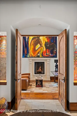 a kitchen with stainless steel appliances granite countertop a stove and a refrigerator