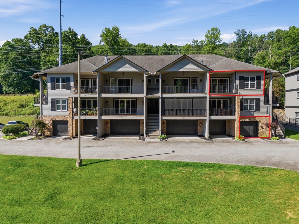 2143 Ridgecrest Circle, Unit 1 Hiawassee, GA 30546 - Photo 50 of 53 a front view of a house with a garden