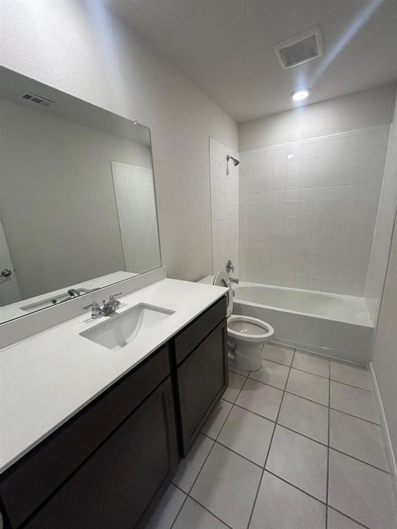 602 Range Drive Princeton, TX 75407 - Photo 16 of 19 a bathroom with a sink a toilet and shower