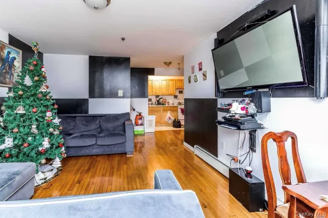 a kitchen with granite countertop a refrigerator sink and cabinets