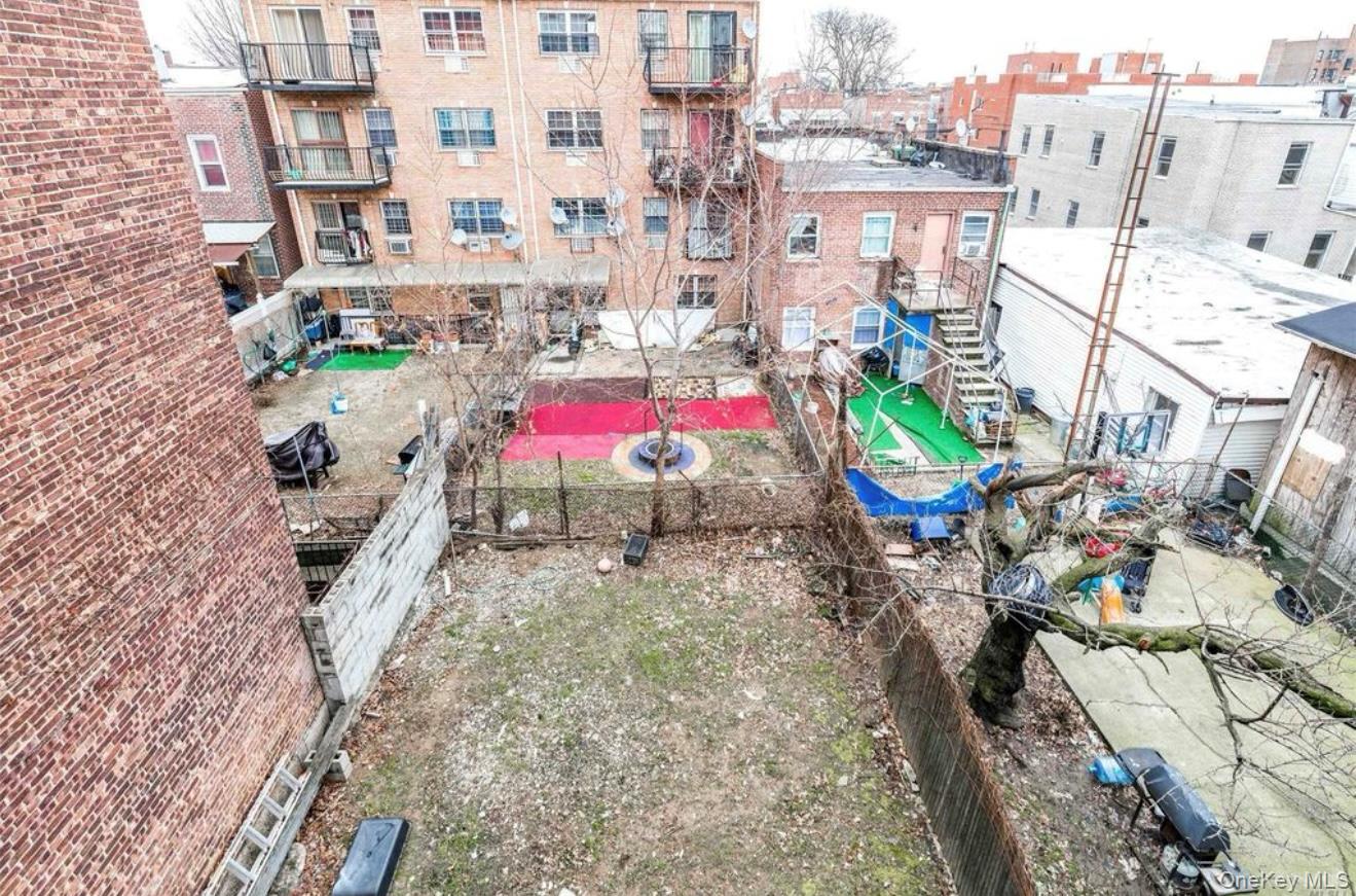 35-43 97th Street Queens, NY 11368 - Photo 10 of 10 a view of a street with tall buildings