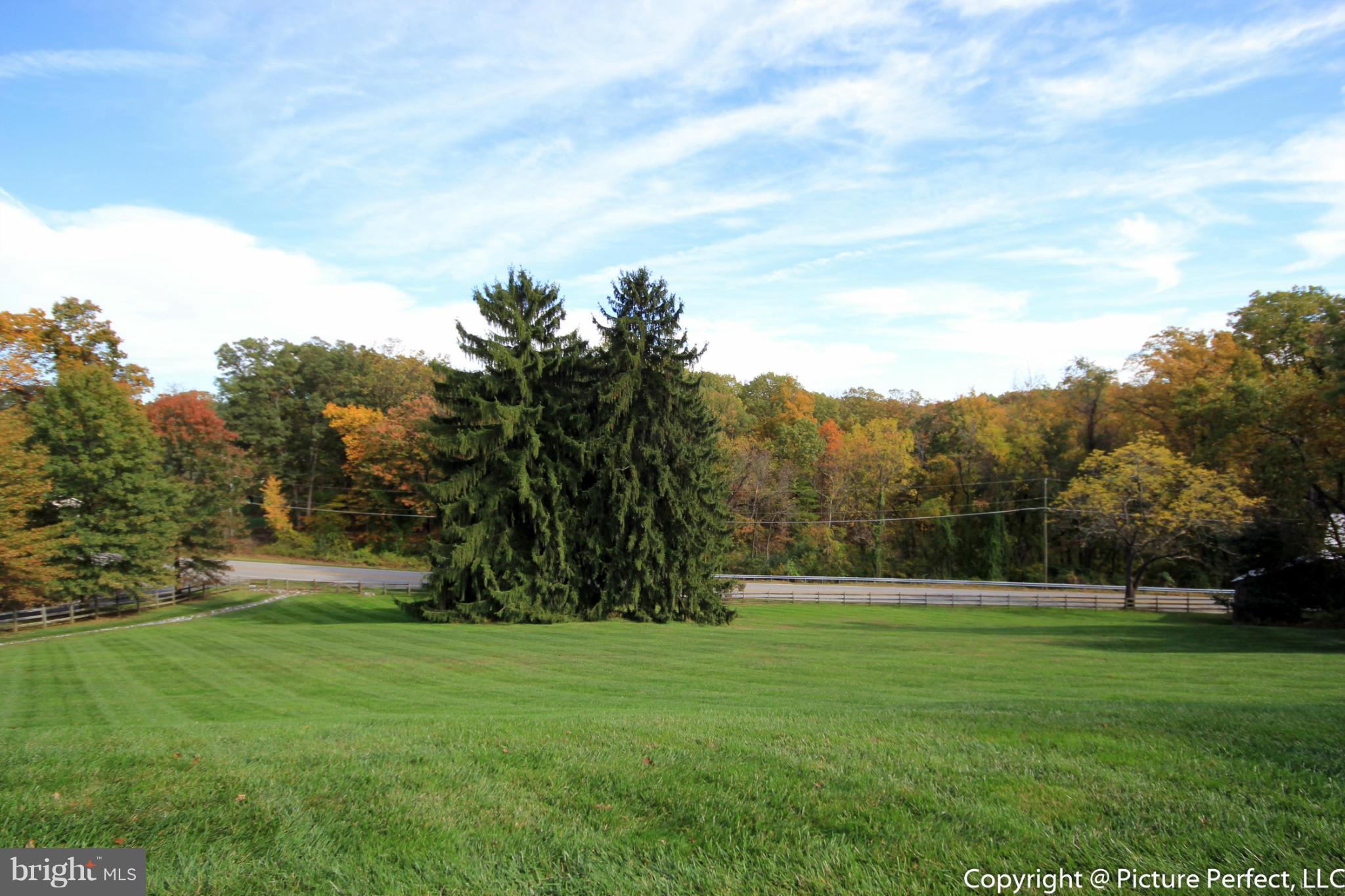 5380 Stone Road Frederick, MD 21703 - Photo 2 of 30 a view of grassy field with trees