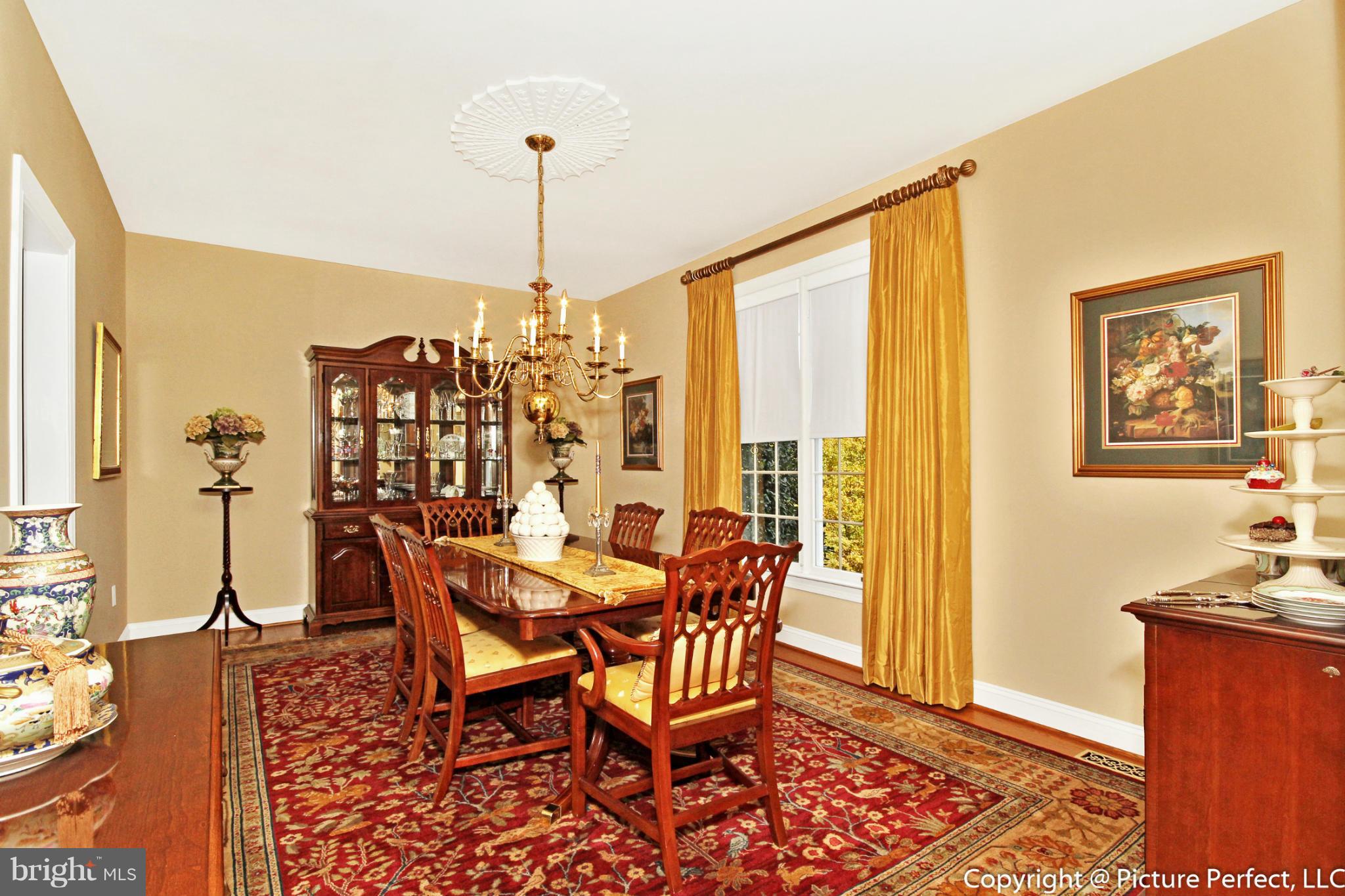 5380 Stone Road Frederick, MD 21703 - Photo 17 of 30 a dining room with furniture and window