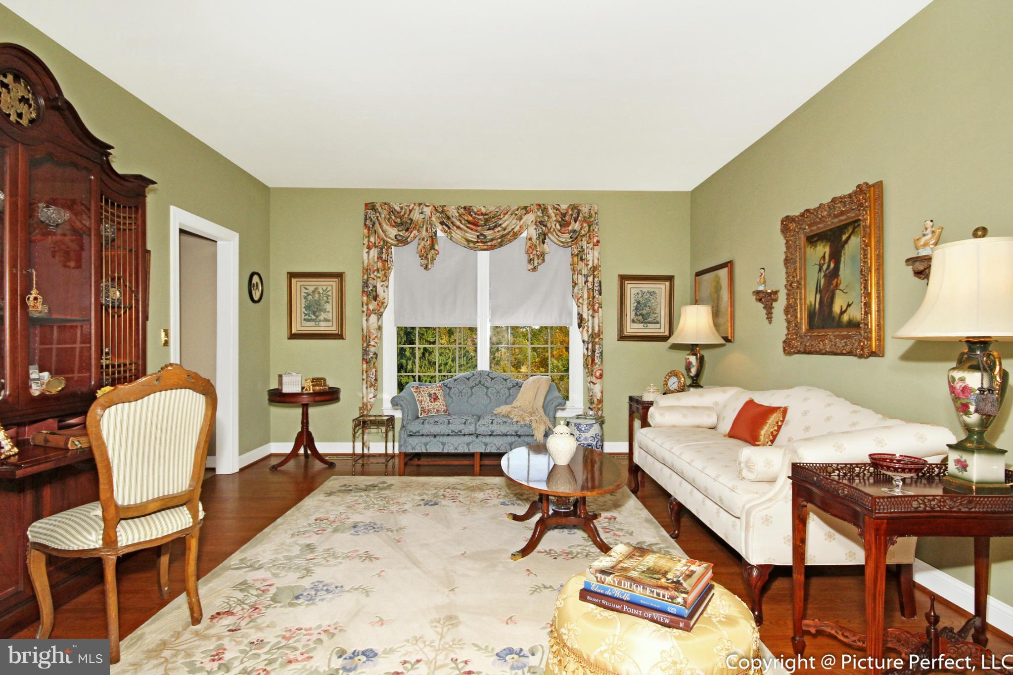 5380 Stone Road Frederick, MD 21703 - Photo 19 of 30 a living room with furniture and a rug