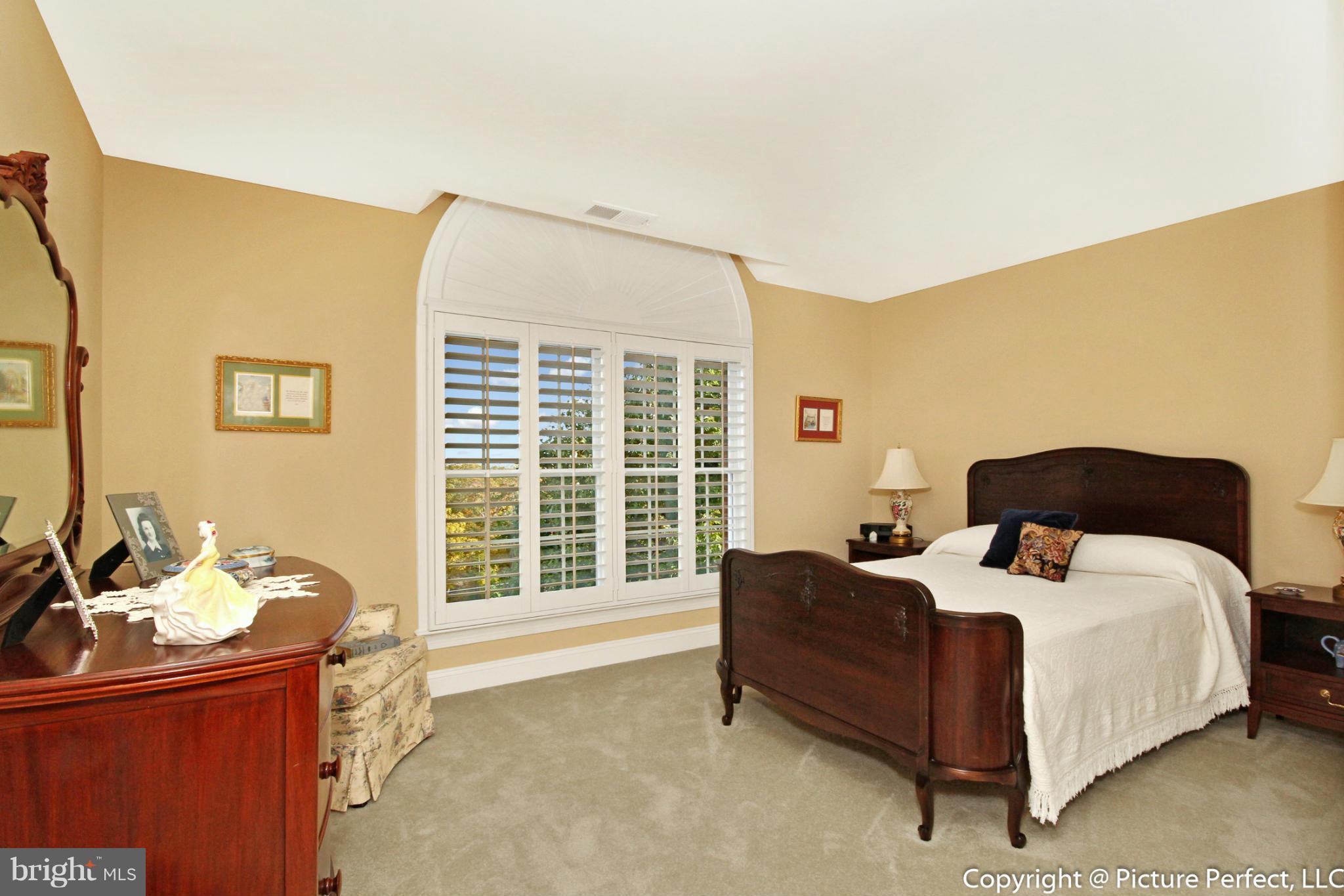 5380 Stone Road Frederick, MD 21703 - Photo 27 of 30 a bedroom with bed and windows