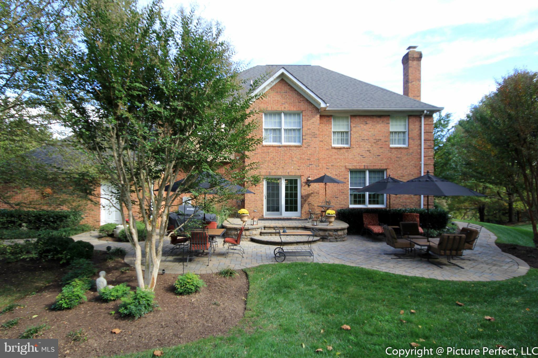 5380 Stone Road Frederick, MD 21703 - Photo 4 of 30 a front view of a house with sitting area and garden