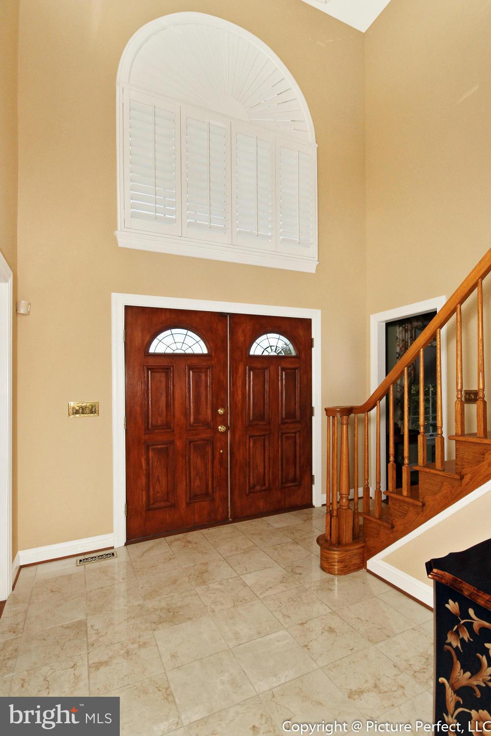 5380 Stone Road Frederick, MD 21703 - Photo 9 of 30 a view of an entryway with wooden floor
