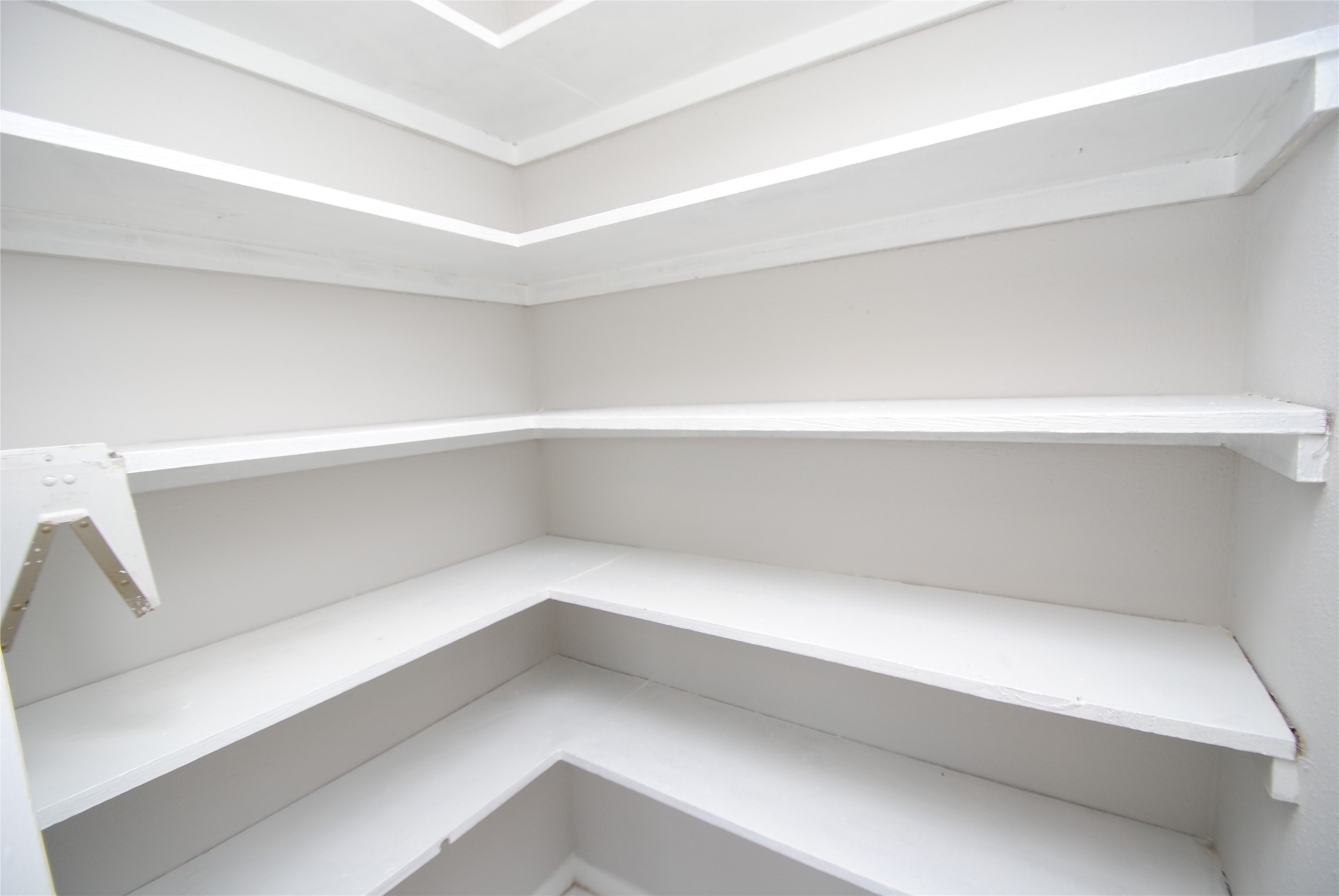 22831 John Rolfe Lane Katy, TX 77449 - Photo 16 of 34 a storage room with empty racks
