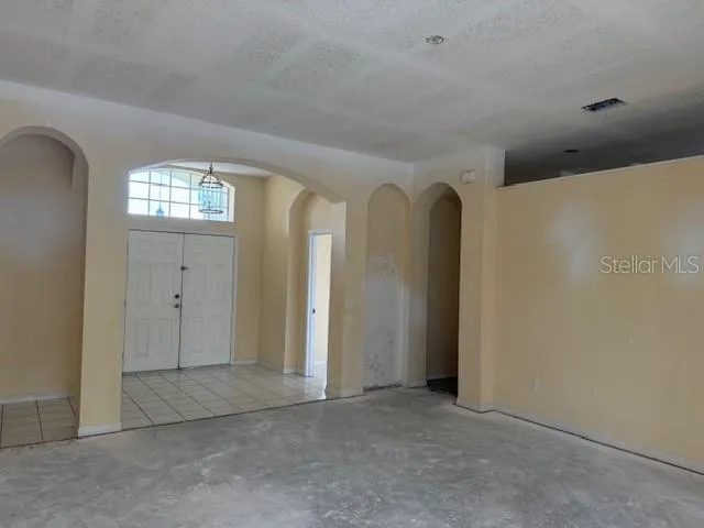 an empty room with windows