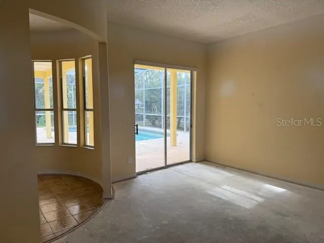 a view of hallway with wooden floor