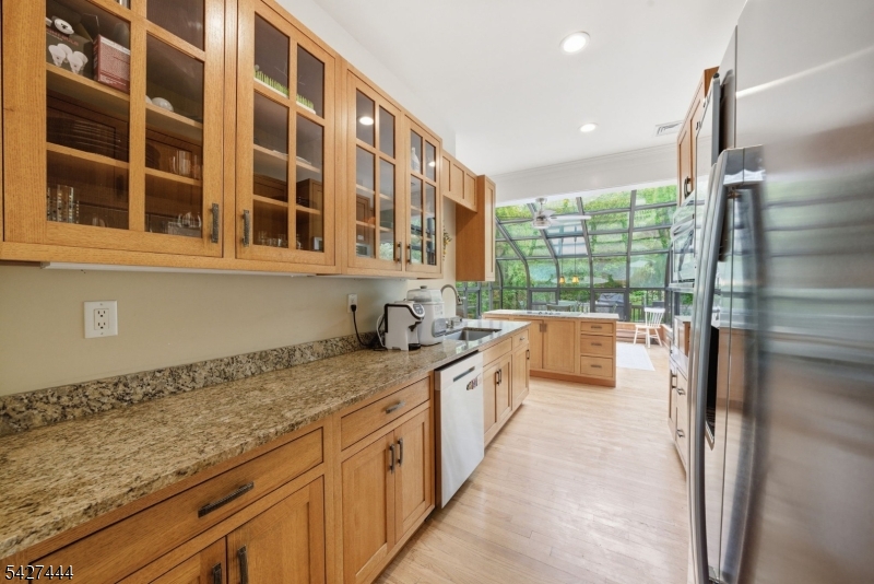156 Kingsland Road Boonton, NJ 07005 - Photo 10 of 38 a kitchen with stainless steel appliances granite countertop a sink and cabinets