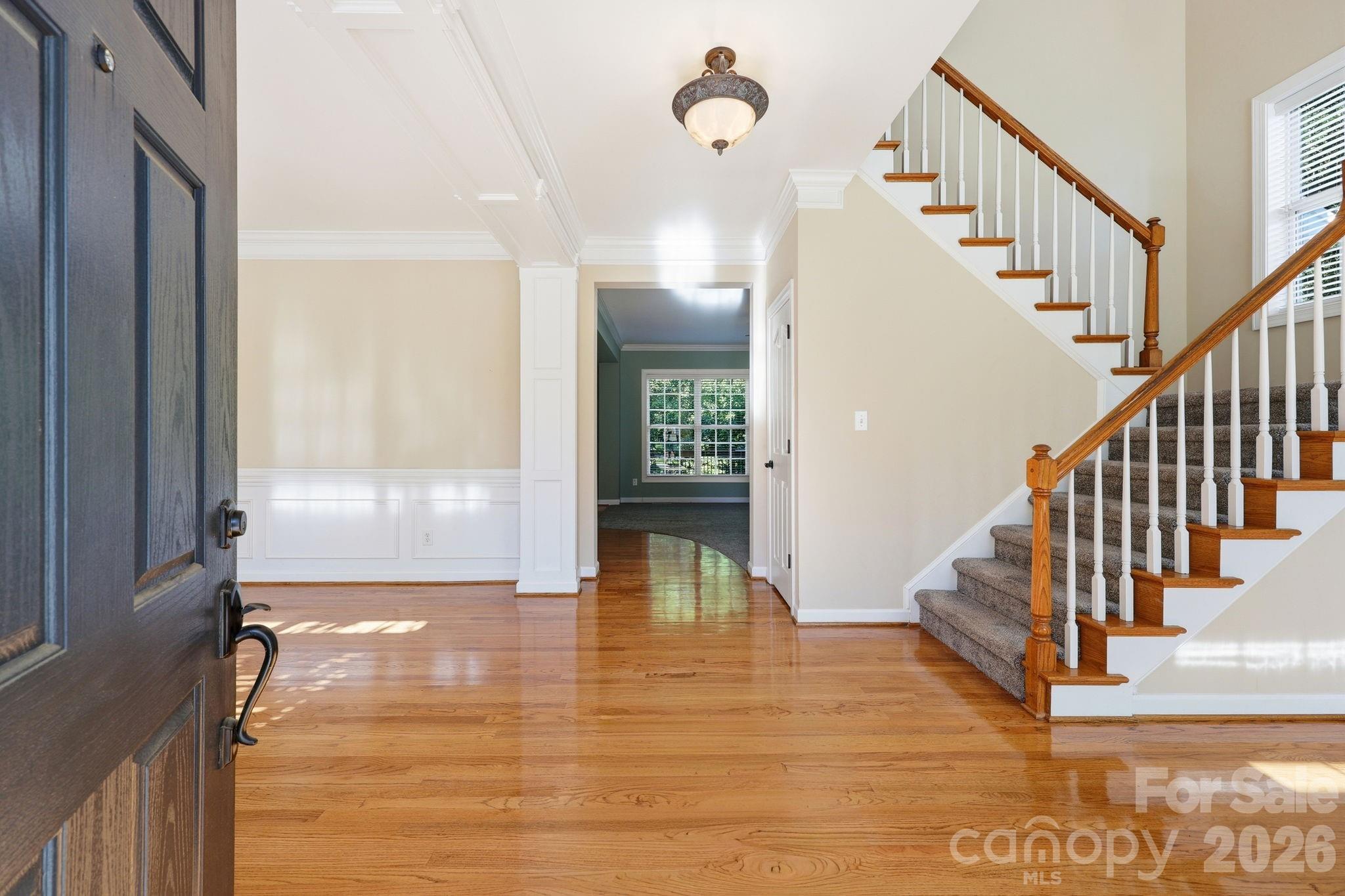 3308 Grandeur Road Charlotte, NC 28269 - Photo 4 of 45 a view of entryway and hall with wooden floor