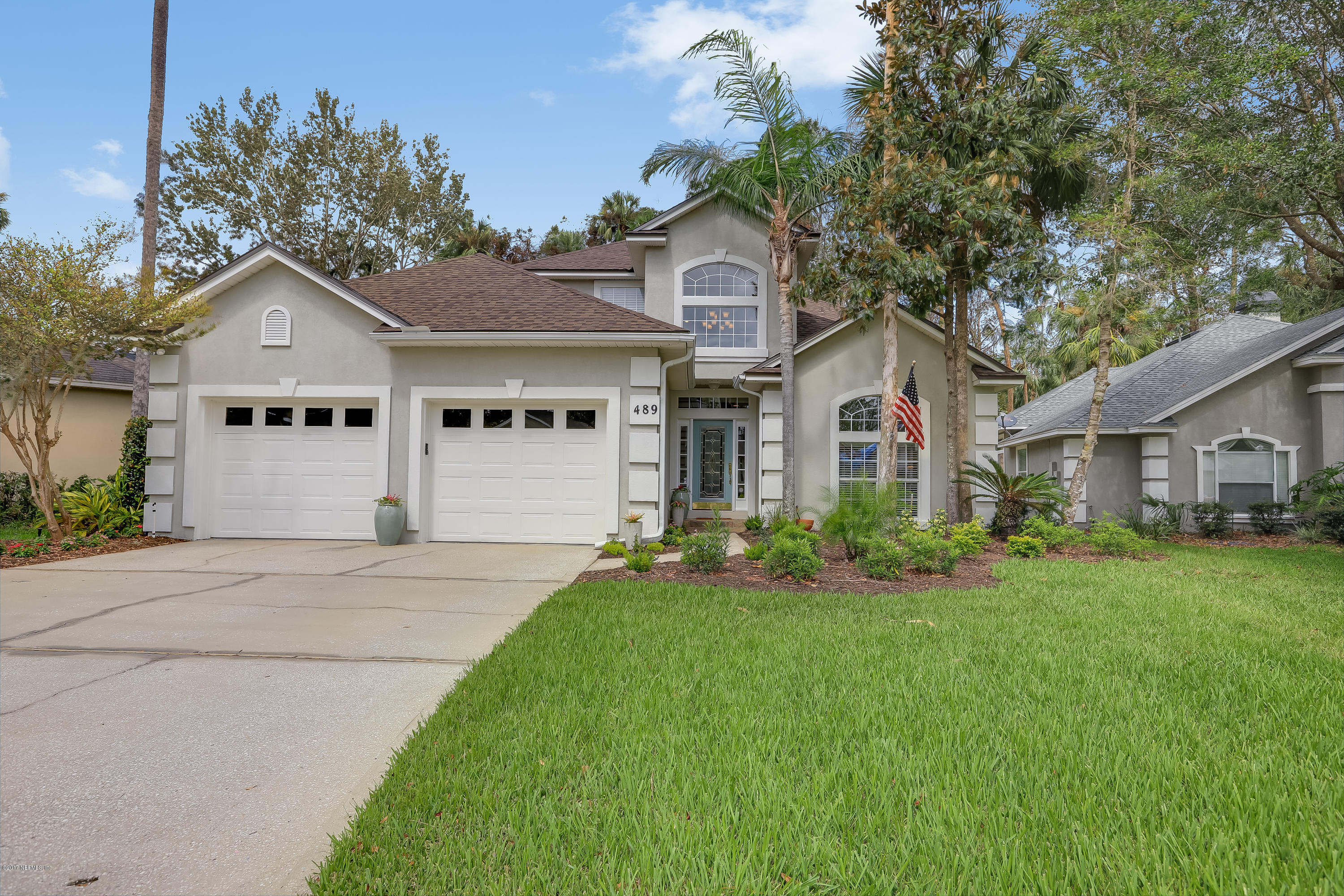489 Big Tree Road Ponte Vedra Beach, FL 32082 - Photo 1 of 32 front view of a house with a yard