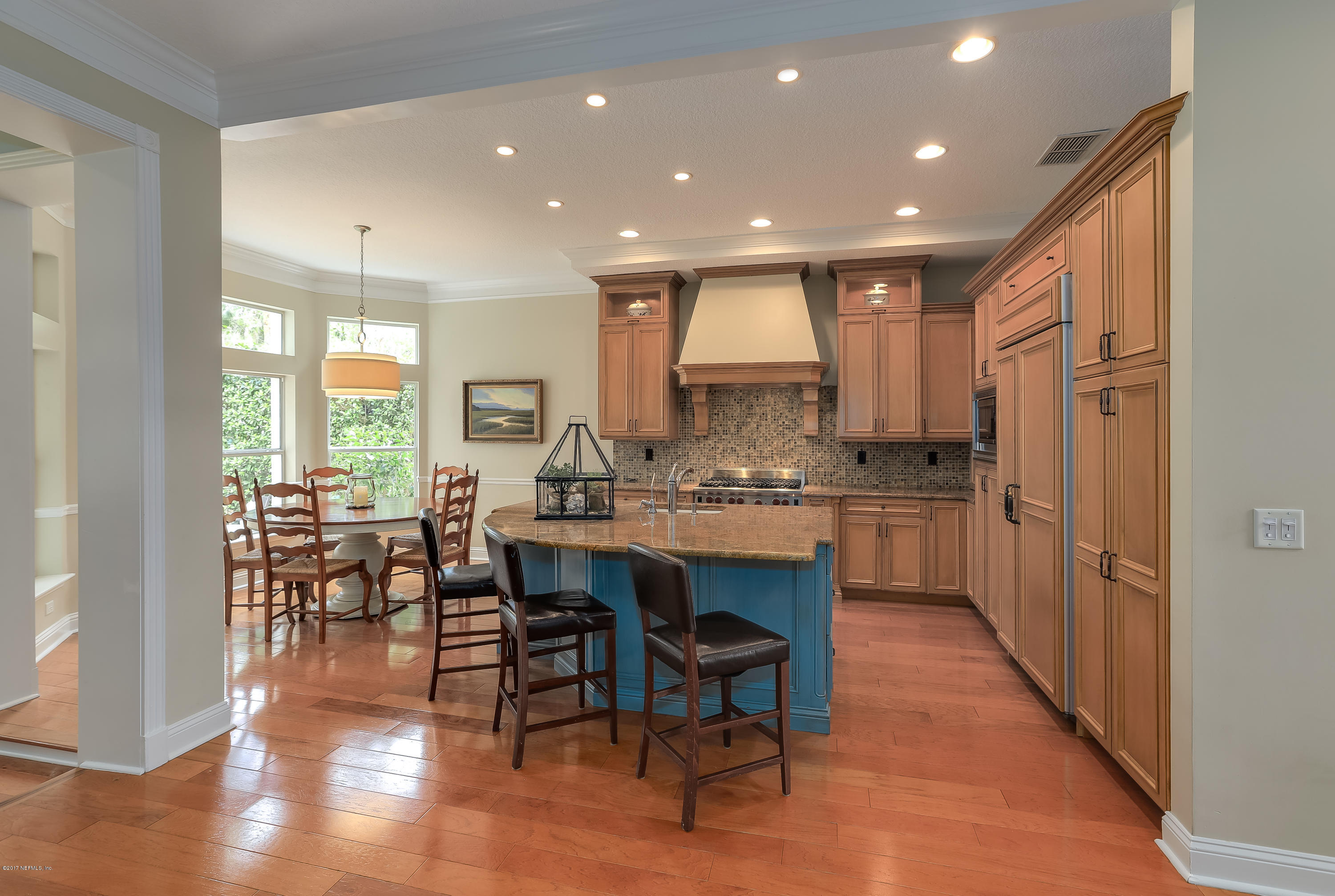 489 Big Tree Road Ponte Vedra Beach, FL 32082 - Photo 12 of 32 a kitchen with a table and chairs in it