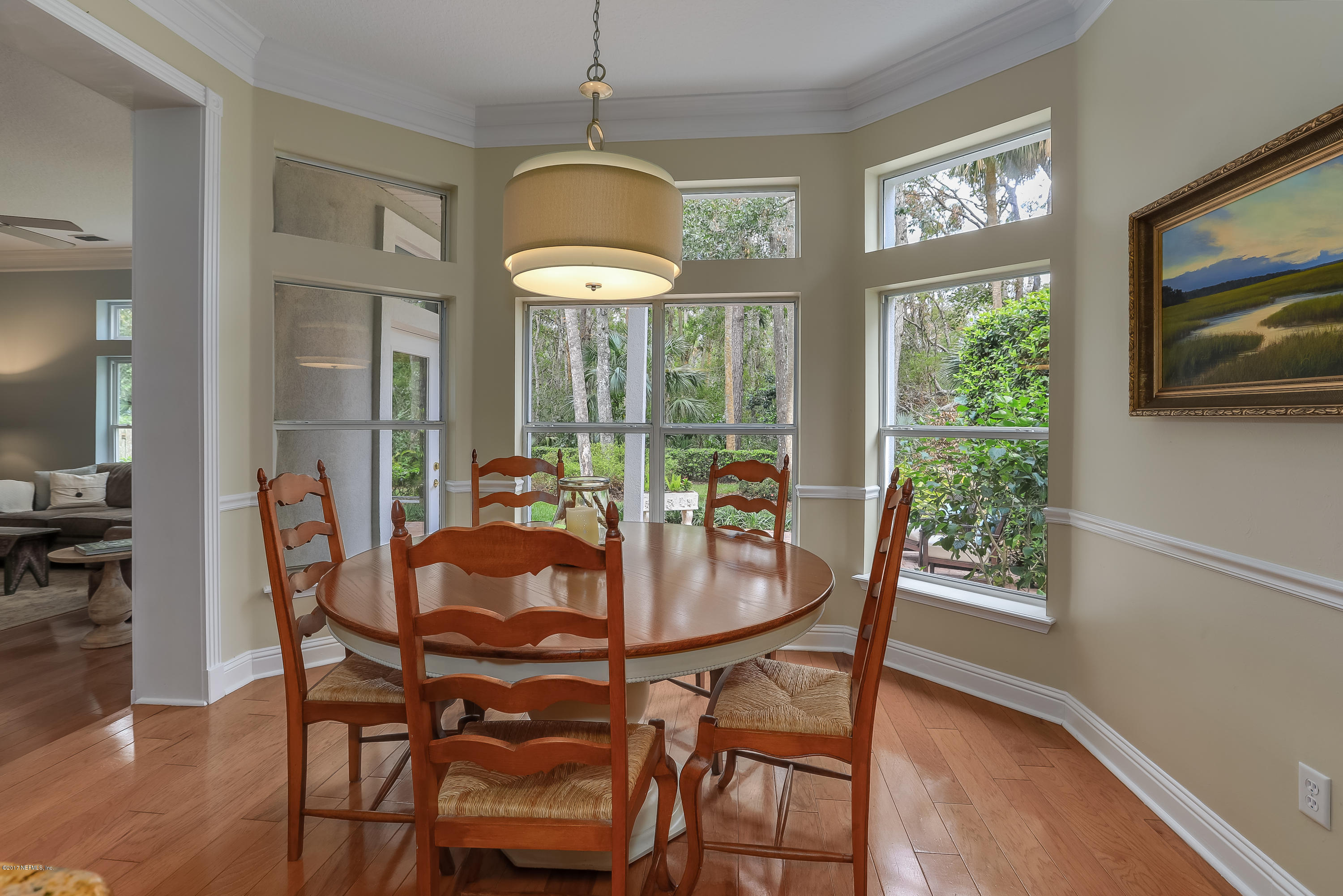 489 Big Tree Road Ponte Vedra Beach, FL 32082 - Photo 13 of 32 a view of a dining room with furniture window and outside view