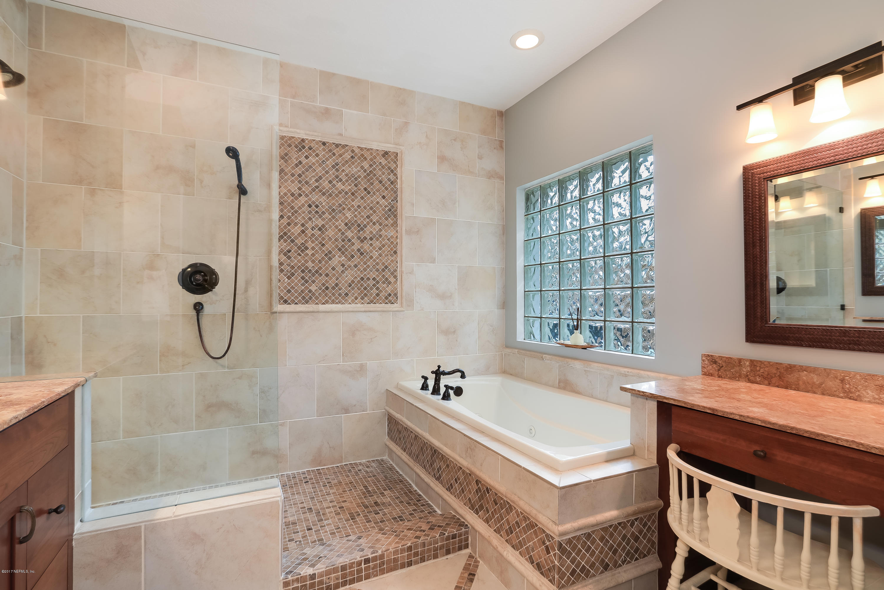 489 Big Tree Road Ponte Vedra Beach, FL 32082 - Photo 15 of 32 a bathroom with a tub a sink and a shower