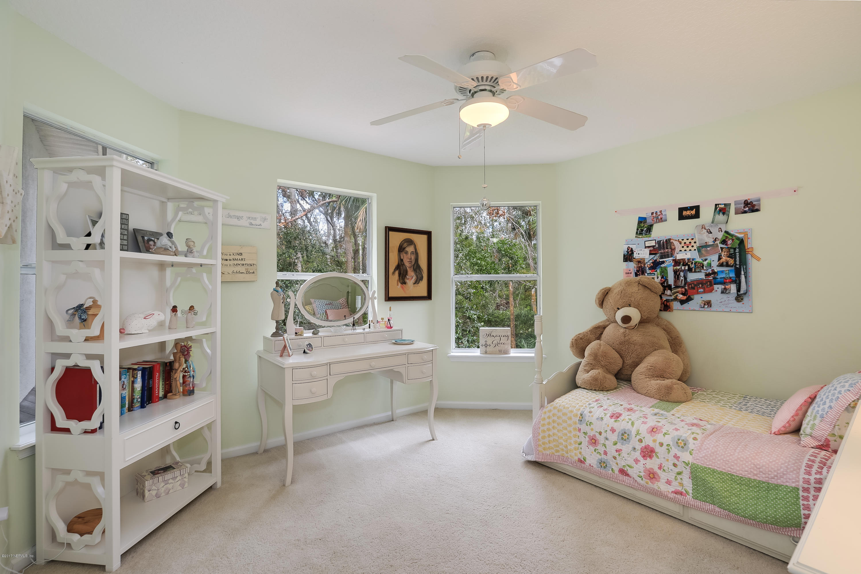 489 Big Tree Road Ponte Vedra Beach, FL 32082 - Photo 18 of 32 a bedroom with a bed and a window