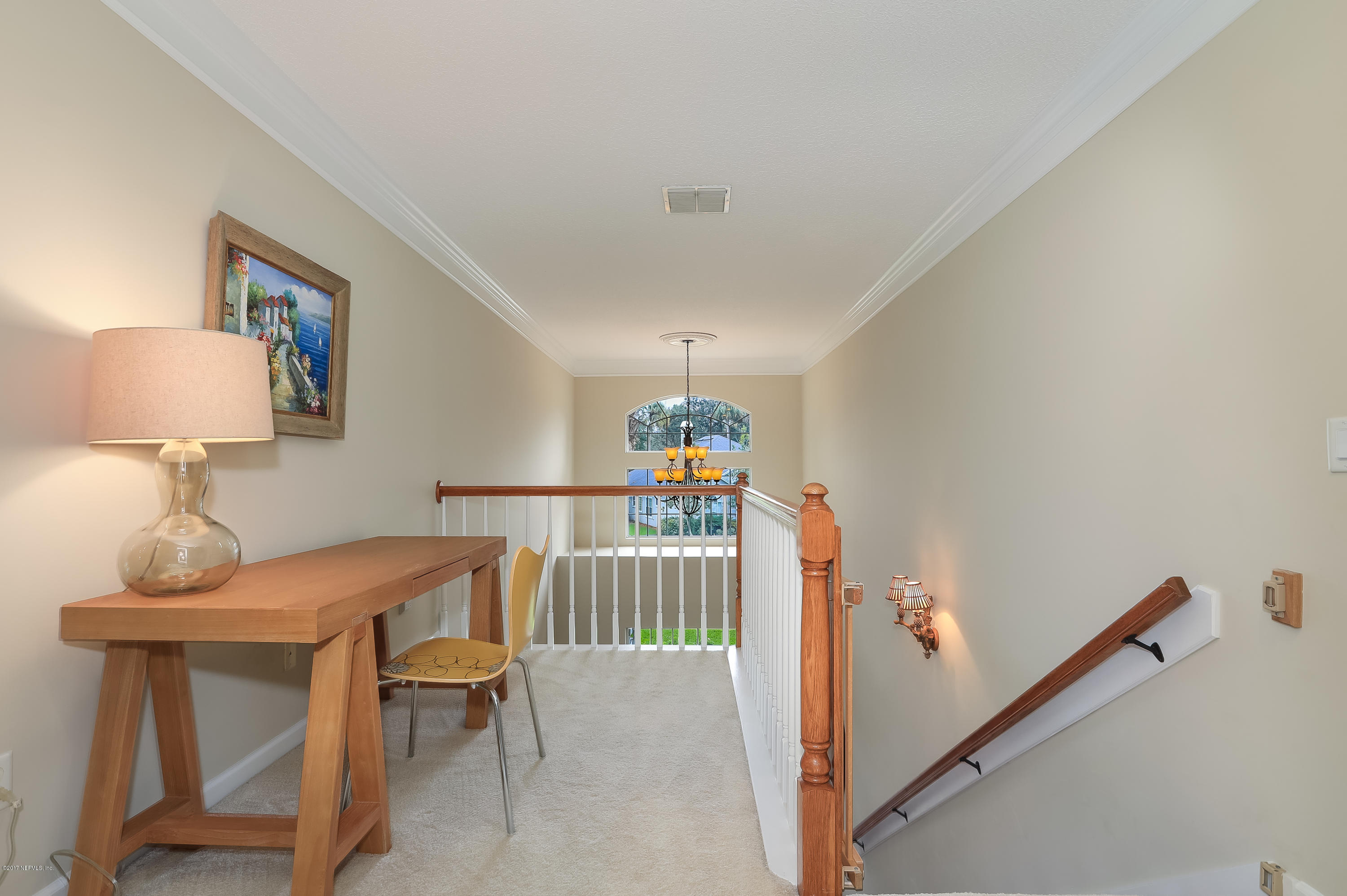 489 Big Tree Road Ponte Vedra Beach, FL 32082 - Photo 22 of 32 a view of a room that has a table and a chair in it